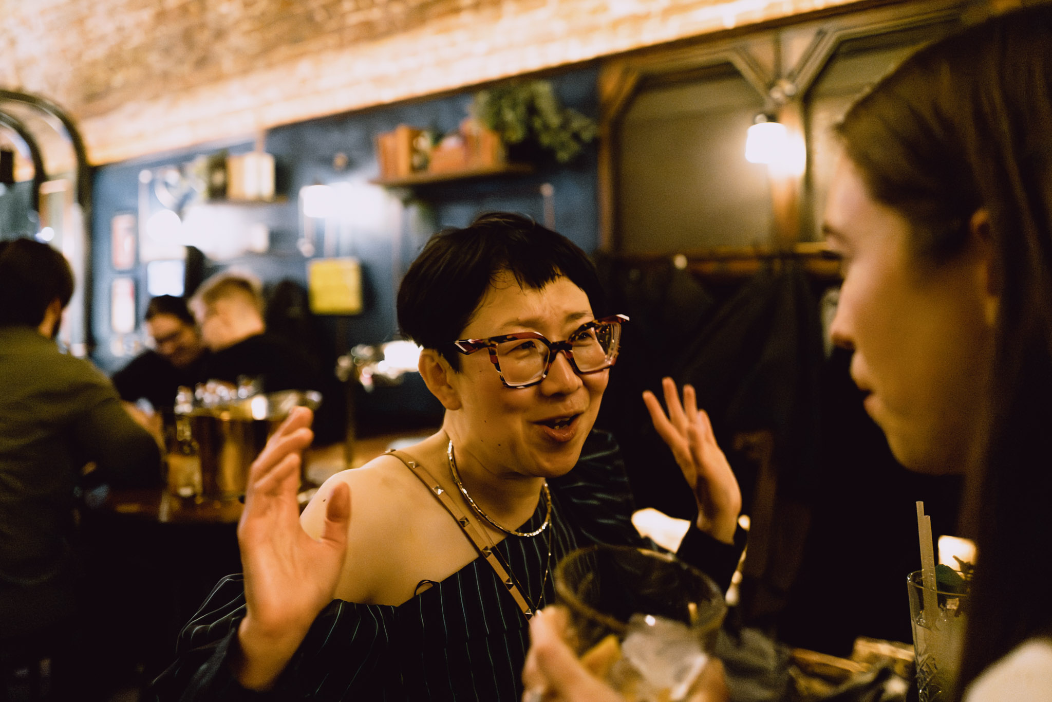 Corporate event — expressive candid, team social.