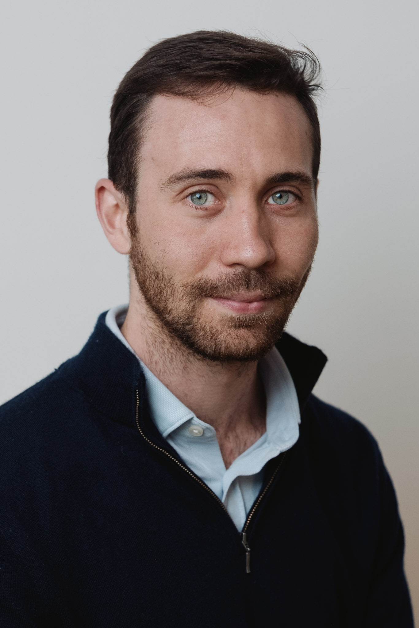 Team headshot — professional portrait, consistent studio styling.